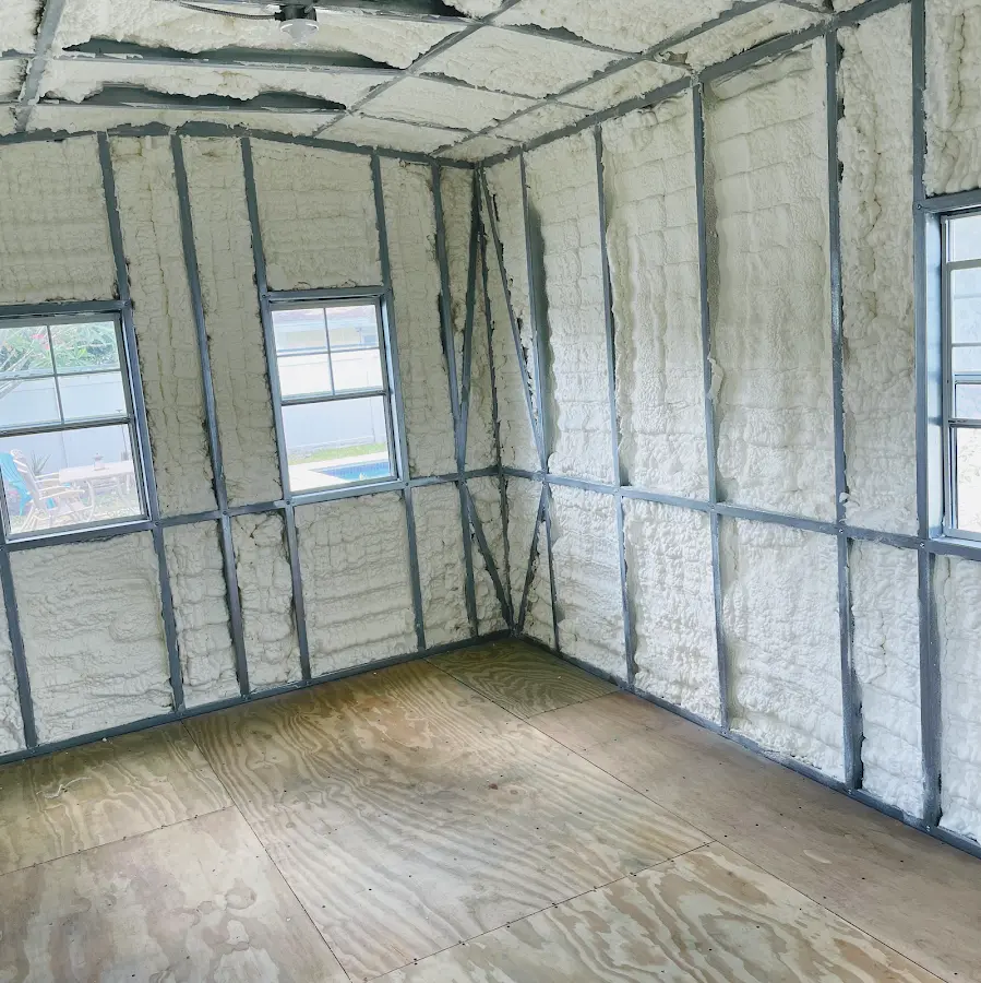 Closed-cell spray foam insulation applied to wall cavities in a residential project in Signal Hill