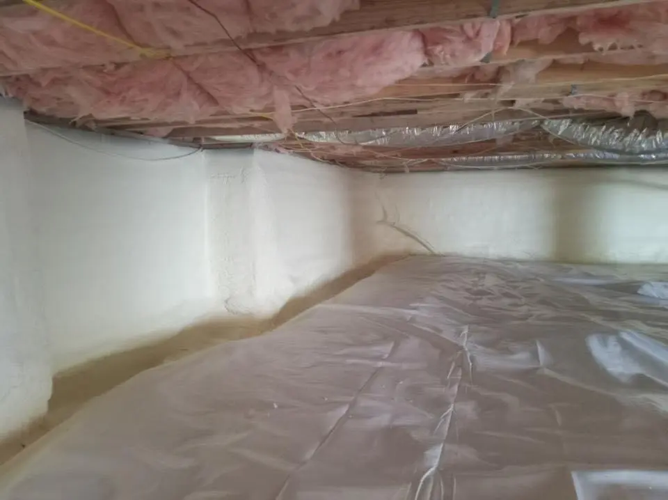Crawl space encapsulation with closed-cell spray foam for Commercial Roof Restoration in Signal Hill